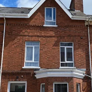 Séjour chez l'habitant Roskeen Townhouse